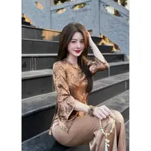 Bộ lụa gấm cúc đàn chị Thọ sang trọng