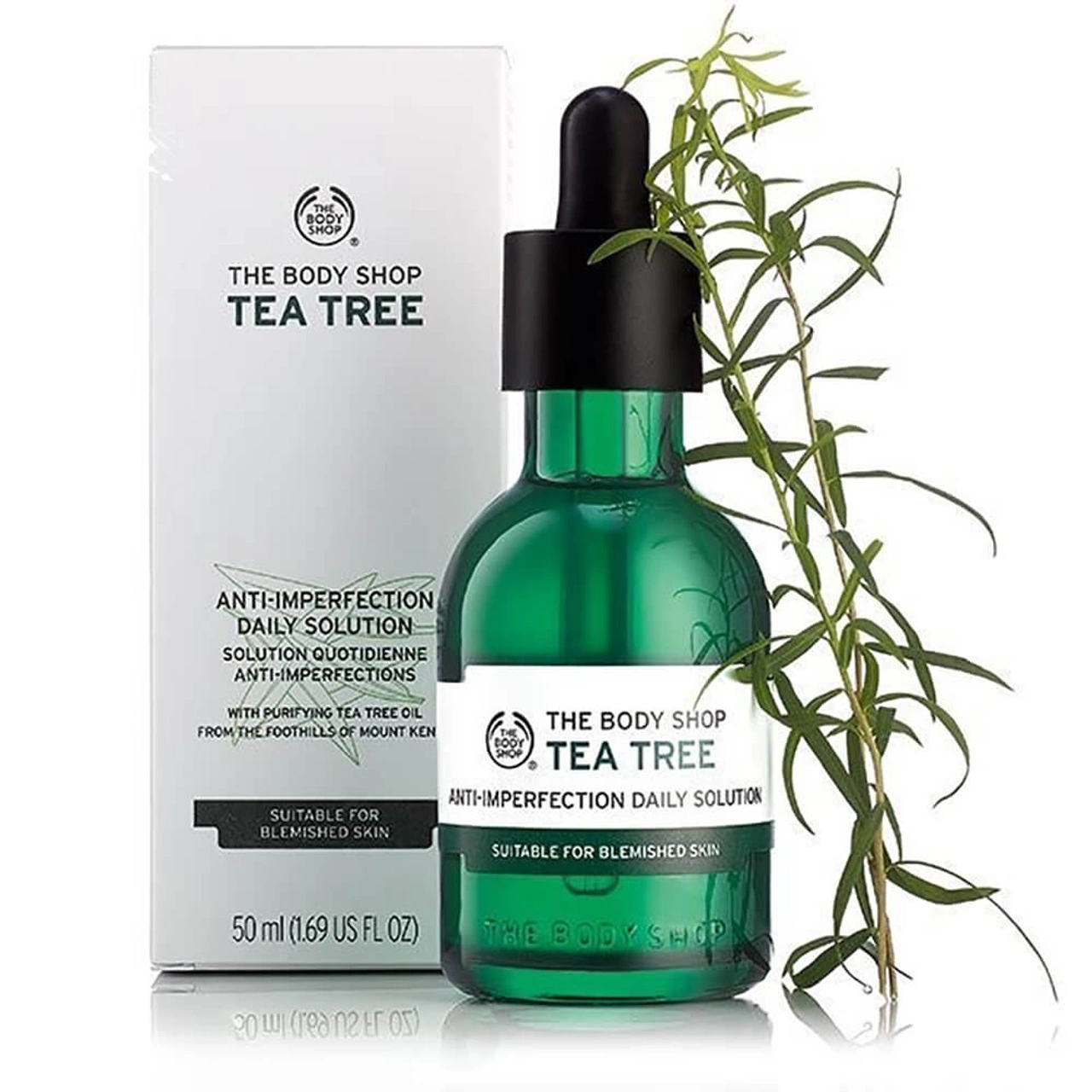 The Body Shop Tea Tree Daily Solution 50ml chai thủy tinh xanh nắp cao su đen hộp giấy trắng